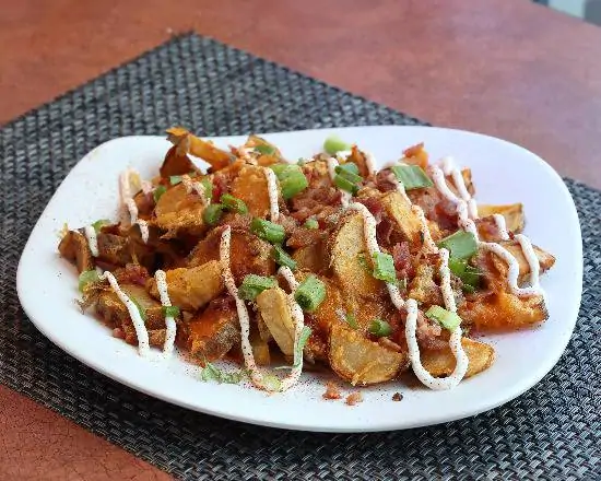 Order Loaded Potato Skins food online from Branns store, Grand Rapids on bringmethat.com