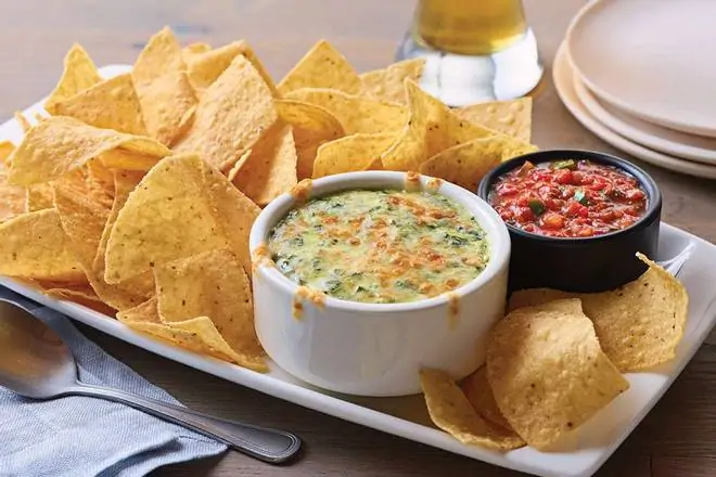 Order Spinach + Artichoke Dip food online from Applebee's Grill + Bar store, Fayetteville on bringmethat.com