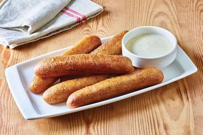 Order Breadsticks With Alfredo Sauce food online from Applebee's Grill + Bar store, Fayetteville on bringmethat.com